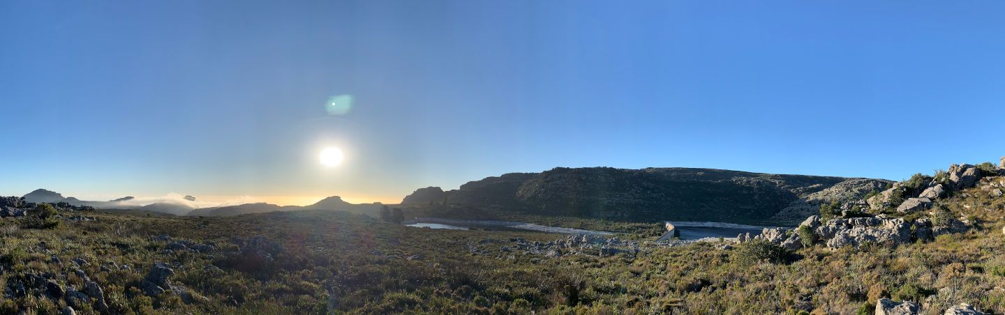 Wide sunny view of Hely-Hutchinson Dam on Table Mountain, Cape Town — from a safe distance, fear seems unnecessary and more easily manageable